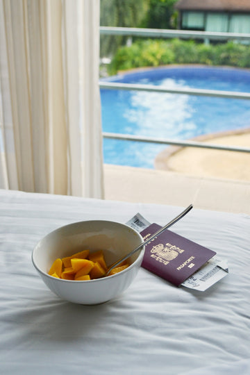 Breakfast, passport, and a pool view.