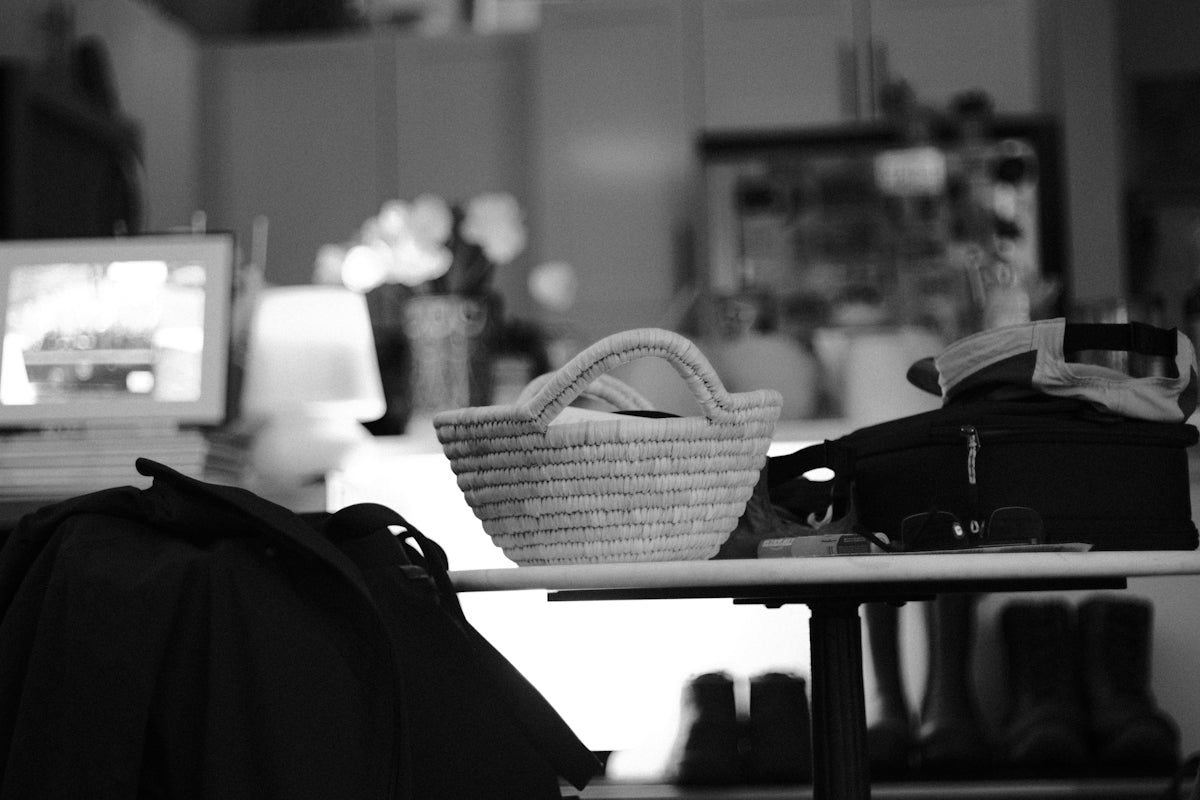 A basket and bag on a table