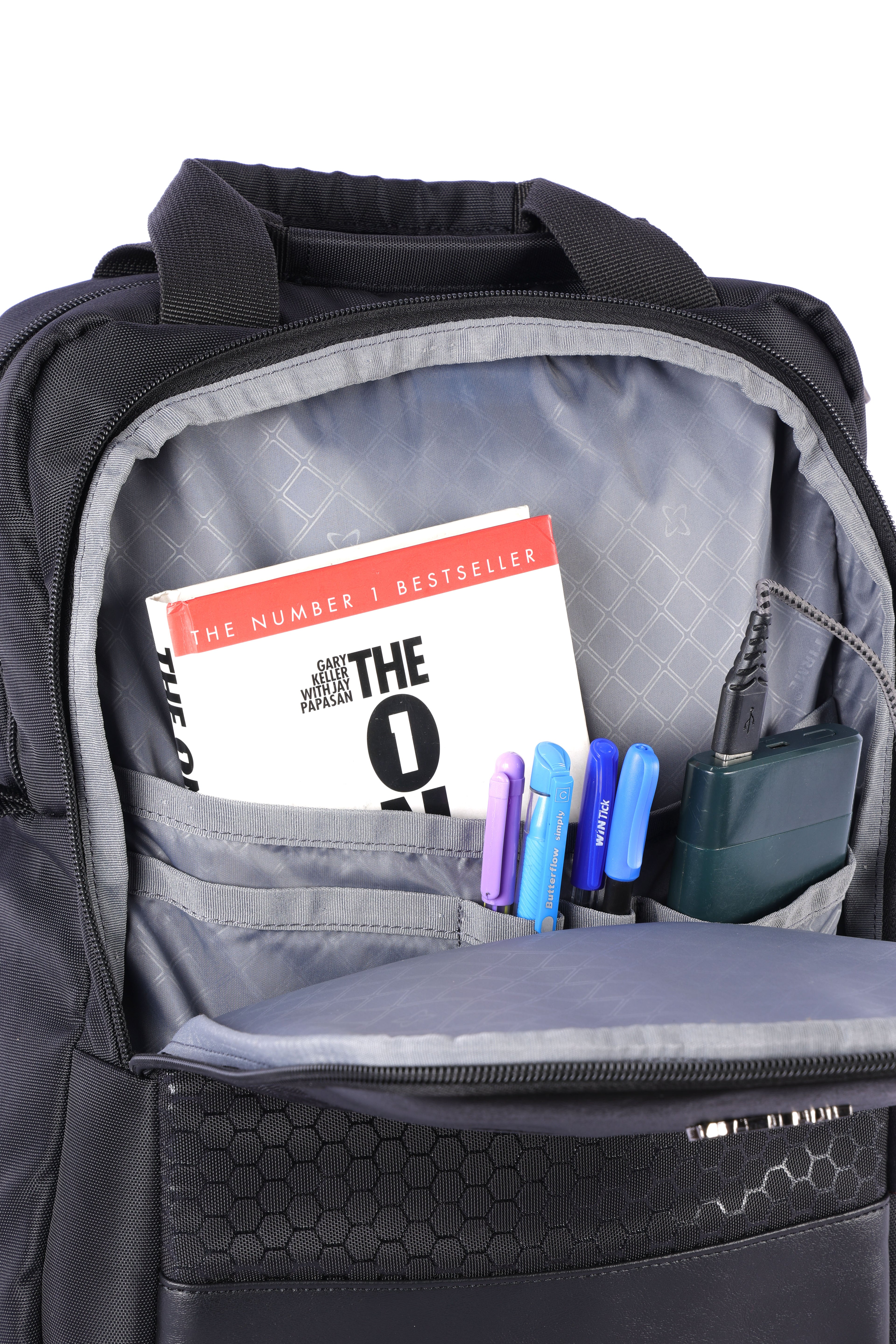 Black convertible backpack with multiple compartments for office use.