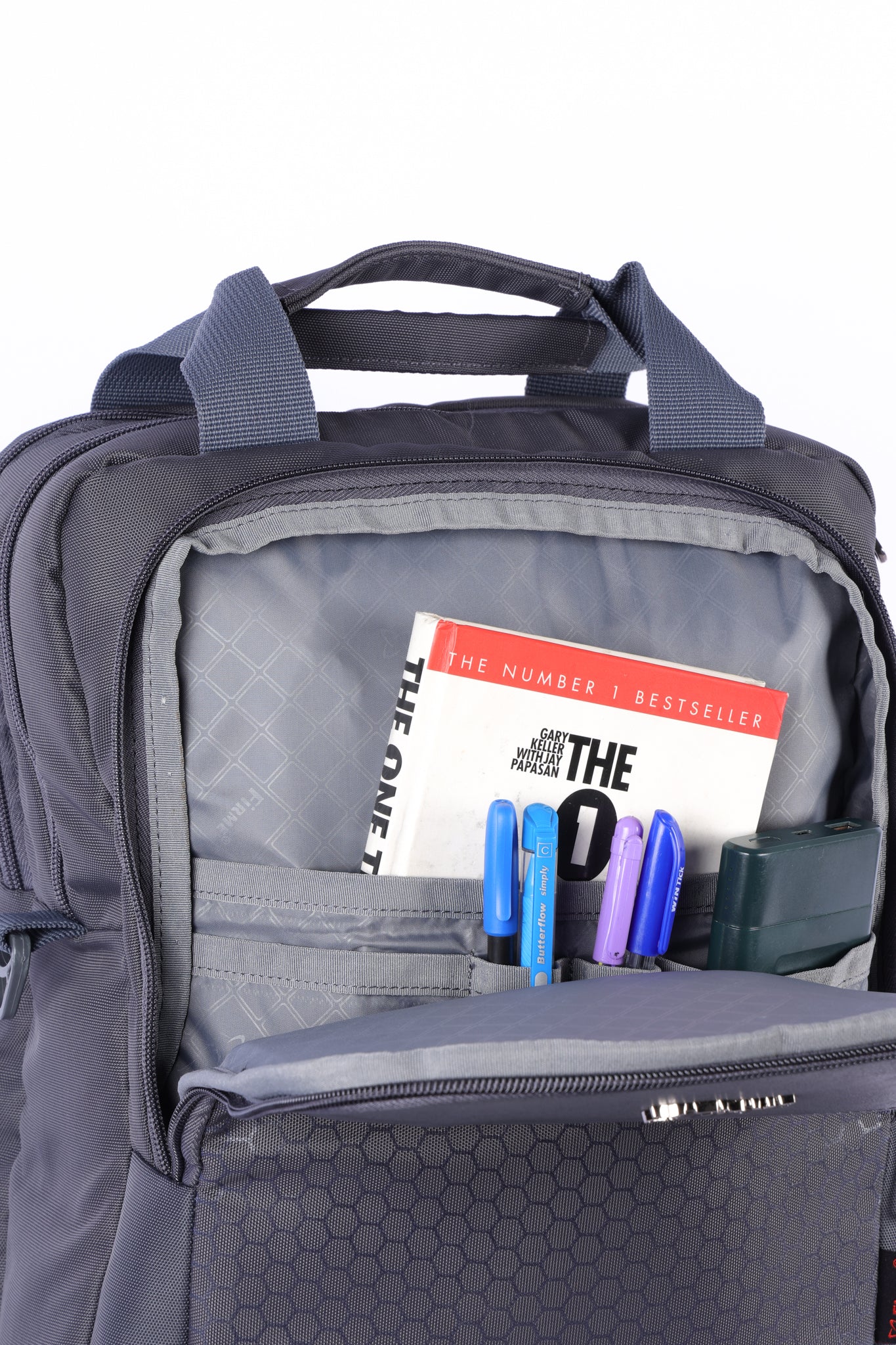 Large black convertible backpack for men suitable for office use with multiple compartments